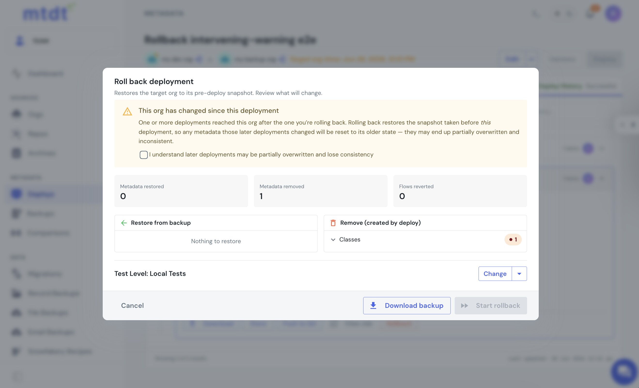 mtdt's rollback dialog warning that the org has changed since this deployment, with an acknowledgement checkbox gating the rollback